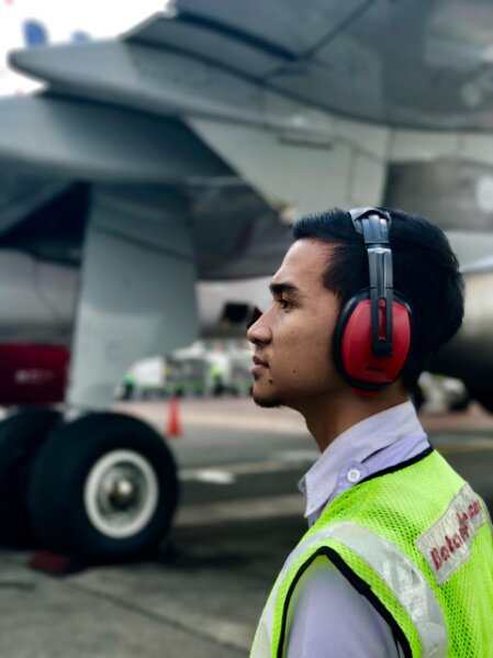 HVAC specialist helping homeowner review financing options